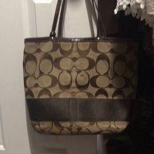 Bucket large Coach Signature handbag.